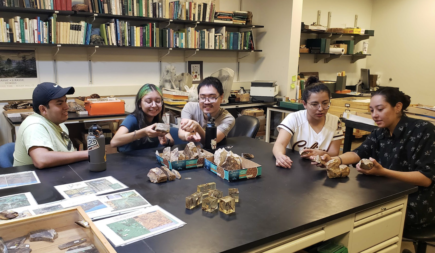 The scholars learn about paleobotany
